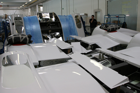 A jigsaw puzzle. Wingroots, engine bays and control surfaces are shown here, painted and ready for reassembly onto the aircraft.