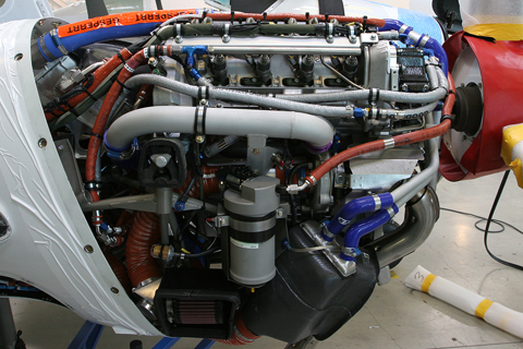 The Twin Star's piece de resistance - the Thielert Centurion 2.0 engine. Both the 1.7 and 2.0 develop the same 135 HP, the difference being in capacity - 1.7 vs 2.0 liters, far less than an equivalent avgas engine - and some changes to the turbocharger system. A condensed mass of wires and pipes, this is not a purpose-built aircraft engine, but a converted and heavily-modified Mercedes roadcar Diesel tweaked to accept more volatile Jet A fuel
