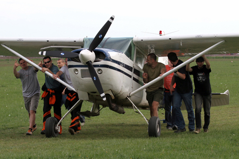 Most photographers would have been content with just a smile or a wave, but I hit the jackpot here! :) Dedicated to all the guys and gals who like to jump out of perfectly serviceable airplanes :)