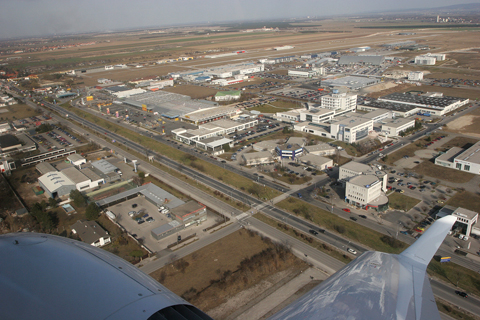 Wiener Neustadt-Ost and the complex that has grown around it. The factory itself consists of just a couple of buildings running parallel to the runway - everything else has been built around the (economic success) of the factory, and even includes a shopping mall and swimming pool :)
