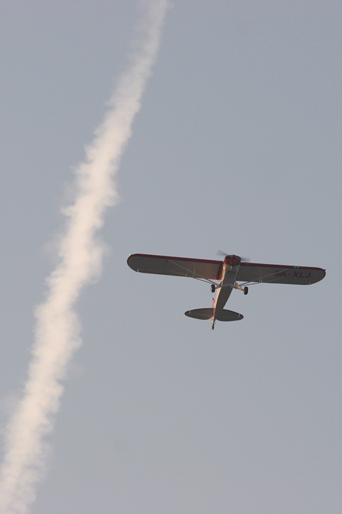 Trundling by at 70 knots while high overhead something zips by at 500+ :)