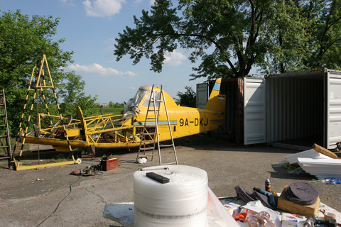 How to pack an airplane... as noted before, the engines and prop had already been removed for overhaul, so all that was left was to take down the wings and landing gear (which are to the left outside the photo)