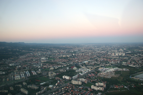 Climbing through about 1,500 feet toward the district of Črnomerec in the western part of town, with the sun just about to set