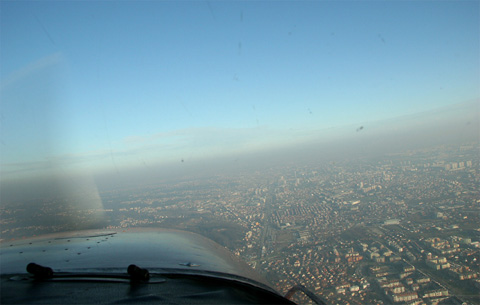 A wide view of the city centre from above the western districts. The nose belongs to 9A-DDD, our favourite ship for panorama flights (myself)