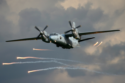 One of the stars of the show, the CroAF Antonov An-32B, firing off flares during a low pass