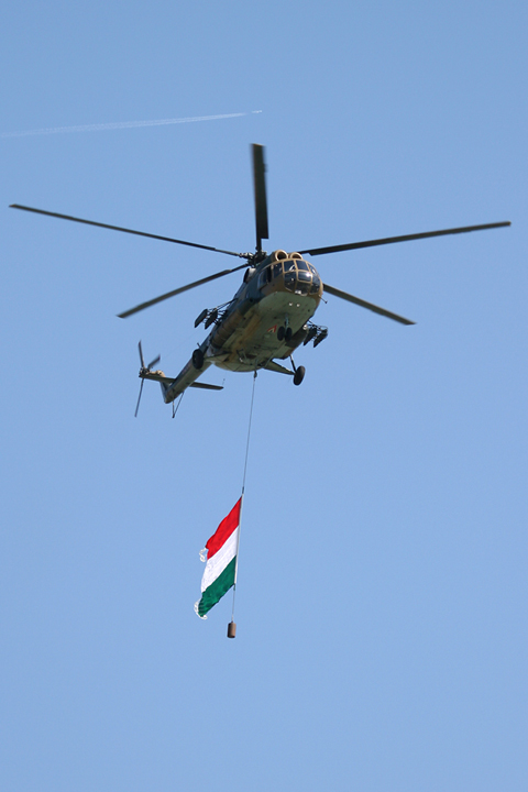 Coinciding with St. Stephen's Day every year, the Air Race normally kicks off with some non-racing airborne festivities. First on the scene was the airforce, with this Mil Mi-8T flying the national flag