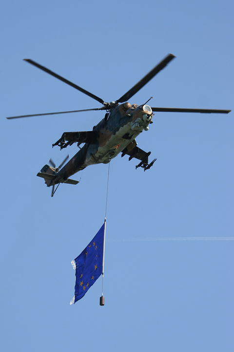 Right on its tail were two - more aggressive - Mil Mi-24V gunships, flying the NATO and EU flags