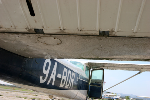 Cleaning out the control surfaces. Despite appearances, everything down here came off easily in just one pass, as seen on the elevator