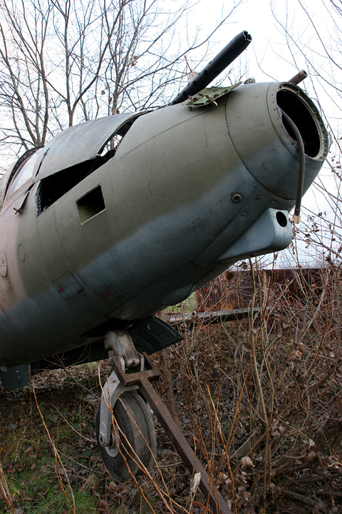 Though nothing heavy appears to have been removed - except the cockpit instruments - 007 tipped over at some point, probably with some assistance. The two .50 cal Brownings are still on, which suggests this aircraft was spared the usual vandalism and cannibalism