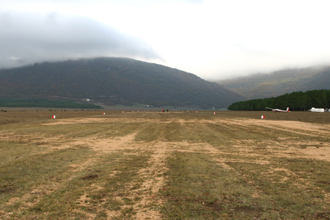Looking straight down the full 500 meters of the runway. The first 150 meters were made soft, presumably to ease the stress of landing
