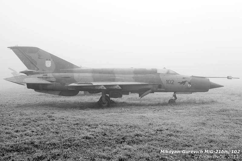 Sad and forlorn - but still not forgotten - old 102 defies the fog on a bitterly cold morning at Zagreb, Croatia's Pleso Air Base. Named "Osvetnik Dubrovnika" ("Avenger of Dubrovnik"), 102 is actually a distinguished combat veteran, having defected - along with three other examples - from the Yugoslav Air Force at the start of the 90s civil war. Comprising three bis interceptors and a lone recce R model, these four would eventually become the stuff of local legend, with several of them going on to form the first proper fighter wing fielded by the nascent Croatian Air Force.