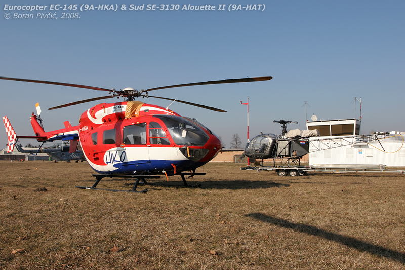 Quite the contrast as HKA and HAT share a fine winter day at Lučko. Sporting the company's distinctive paint scheme, HKA was kitted out with a full HEMS interior, as opposed to the more spartan HKB