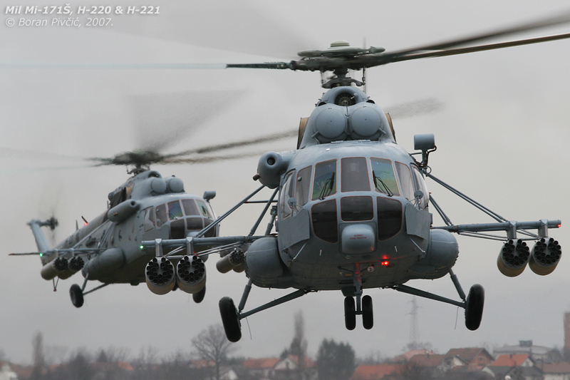 Pomp and Circumstance (sort of) as H-220 and H-221 approach the apron for the first time on this suitably dreary and grey day. Still smelling of newness and loaded with a host of options, these machines would quickly become the new backbone of the fleet, relegating the legacy 8s to secondary roles. As evident, they also have the capability to carry and use unguided rocket packs, allowing them to stand in (at least in theory) for the decommissioned Mi-24 fleet