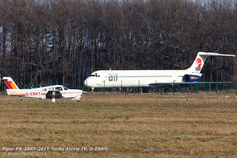 "Haha, I'm flying and you're not!". A visitor from Germany is preparing for takeoff down Maribor's RWY 14, while MD-82 S5-ACC slowly rots away in the background... a fixture of the airport for several years now, ACC had previously flown with Aurora Airlines, and was at the time said to be one of the better Mad Dogs in the area. Sadly, its current state leaves very little hope it could one day regain that reputation... (though - with any luck - it will be featured in a more extensive post later on)