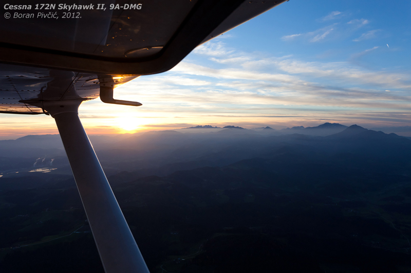 Enjoying the fresh breeze at 5,000 ft as we rumble northwards above Slovenia. Pretty soon we'd turn west towards the Julian Alps - visible in the distance - where we'd pop up to 7,000 and switch to IFR for our night-time return home.